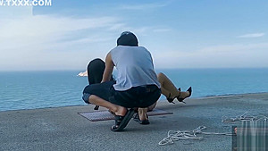 Chinese girl public bondage seaside