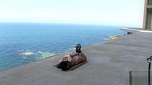 Chinese girl public bondage seaside