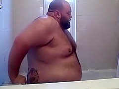 Chubby Bear playing in the tub