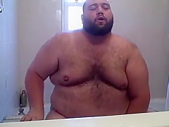 Chubby Bear playing in the tub