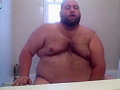 Chubby Bear playing in the tub