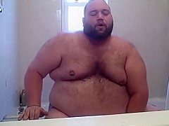 Chubby Bear playing in the tub