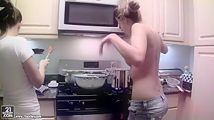 Cindy Hope and Sandy are cooking in the kitchen