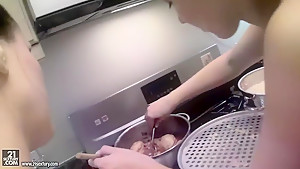 Cindy Hope and Sandy are cooking in the kitchen
