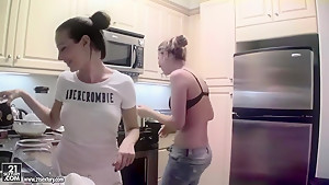Cindy Hope and Sandy are cooking in the kitchen