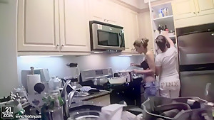 Cindy Hope and Sandy are cooking in the kitchen