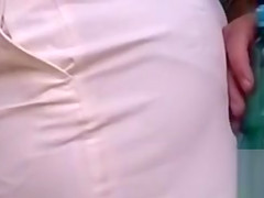 Classy broad has her white skirt pulled up and her sexy underwear revealed