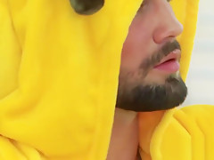 Costumed Jeffrey Lloyd tugging hairy cock and cumshot