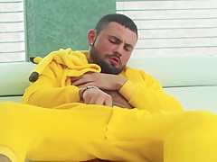 Costumed Jeffrey Lloyd tugging hairy cock and cumshot