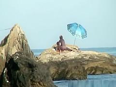 Couple caught fucking in the rocks