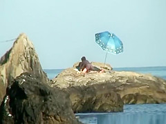 Couple caught fucking in the rocks
