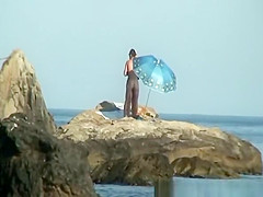Couple caught fucking in the rocks