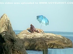 Couple caught fucking in the rocks