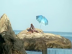 Couple caught fucking in the rocks