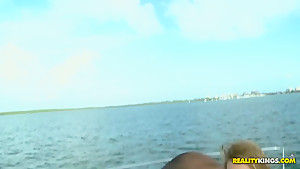 Courtney Cummz rides on Jmac on the boat