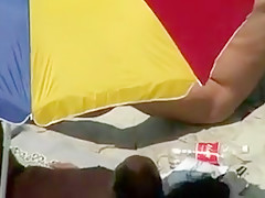 Cuckold bitch at the beach
