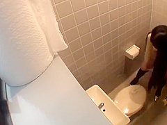 Cute Japanese Peeing Herself in the Bathroom