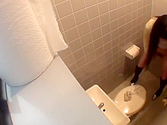 Cute Japanese Peeing Herself in the Bathroom