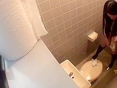 Cute Japanese Peeing Herself in the Bathroom