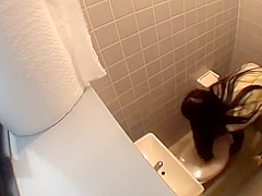 Cute Japanese Peeing Herself in the Bathroom