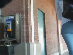 Cutie in tight jeans flaunts her ass in a hot candid street video
