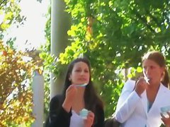 Cutie in tight jeans flaunts her ass in a hot candid street video