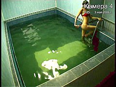 Doll in bikini in pool
