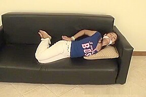 Exquisite Asian babe tied up on a couch