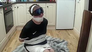 Footballer bound and gagged tight in duct tape 3