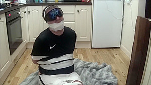 Footballer bound and gagged tight in duct tape 3
