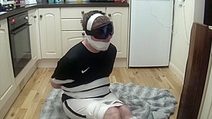 Footballer bound and gagged tight in duct tape 3