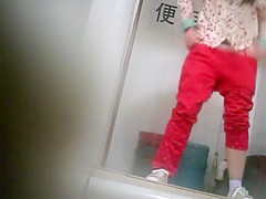 Geeky chinese girl spied while pissing