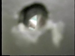 Girl in dressing room from above on