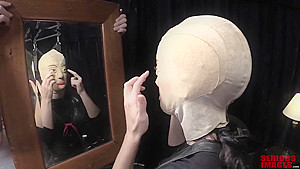 Girl tied in ugly female mask ( 1/2)