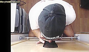 Gloryhole amateur DILF sucking and tugging BBC at home
