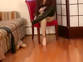 Goddess putting leather boots 1