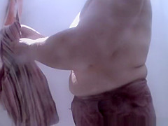 Hairy pussy woman showers in beach cabin