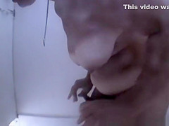 Hairy pussy woman showers in beach cabin