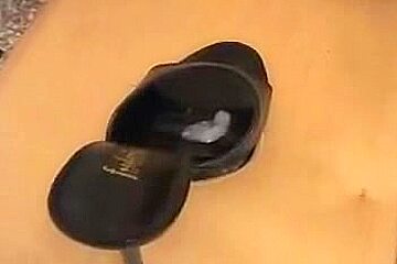 Homemade shoe fetish footjob from a skilled woman