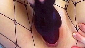Horny Girl In Fishnet Stockings Masturbates With A Huge Dildo