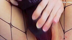 Horny Girl In Fishnet Stockings Masturbates With A Huge Dildo