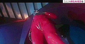 Horny Girl In Red Latex Suit Dominates