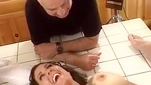 Horny husband watches his wife get her pussy fingered and licked in the kitchen