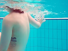 Hot Tatted Babe Dashka Has Big Tits Swirling Underwater