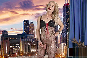 Hot blonde tgirl pulling on her cock solo