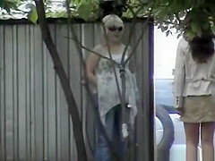 Hot brunette and blonde friend peeing outdoors