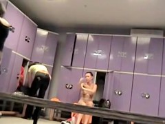 Hot brunette is naked staying far from dressing room