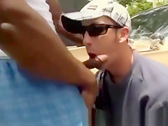 Interracial gangster takes cock in his mouth