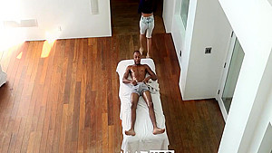 Isis Love uses a massage to touch in her stepsons dick