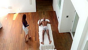 Isis Love uses a massage to touch in her stepsons dick